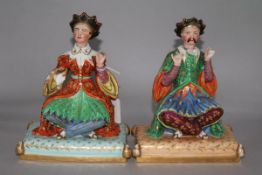 A pair of Paris area figures of a Chinaman and Chinawoman, with detachable heads