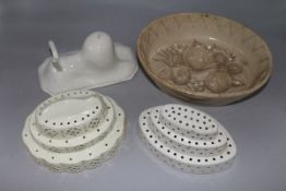 Three 19th century pottery moulds one modelled with a lion and a large mid Victorian pottery jelly