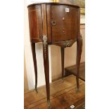 A mahogany oval topped bedside table, on cabriole legs, H.78cm