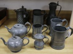 A collection of five pewter tankards, a Scottish pewter Tappit hen and five other pewter items (11)
