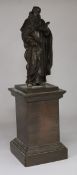 A Coalbrookdale cast iron figure of a scholar, raised on a plinth, dated 1845, overall 16in.
