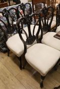 A set of six late Victorian carved mahogany salon chairs