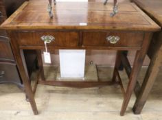 An oak side table, fitted two drawers, W.76.5cm