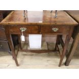 An oak side table, fitted two drawers, W.76.5cm