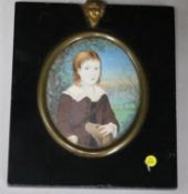 English School, oil on ivory, miniature of a youth with a dog, 8.5 x 7cm
