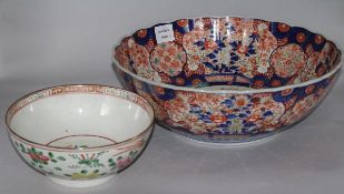 An Imari bowl, diameter 14in. and a Chinese bowl, 7in. (2)