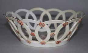 A Chelsea red anchor open pierced circular cake basket, c.1755, 9in. diam (heavily restored)