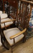 A 19th century American carved oak spindle-back chair (a.f) and a beech open armchair