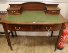 An inlaid Edwardian mahogany dressing table, W.102cm