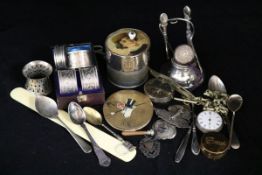 A cased pair of silver napkin rings, 2 silver pocket watches, stand etc