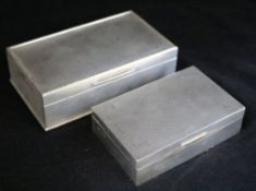 Two modern silver engine turned cigarette boxes