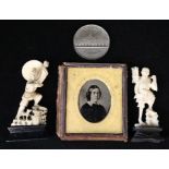 A medal, a daguerrotype and ivories