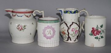 Two polychrome pearlware jugs and two similar mugs, c.1790-1800