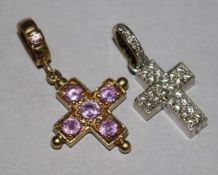 An Italian 18ct white gold and diamond set cross pendant and one other cross pendant, 1in et infra.