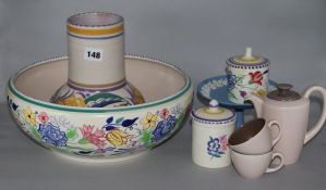 A Poole vase, a bowl, jam pots and a teawares