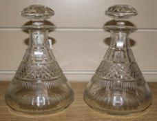 A pair of small Georgian hobnail cut decanters