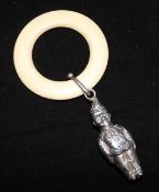 A 1950's silver figural baby's rattle, W.H. Collins & Co, Chester, 1954, 2in.