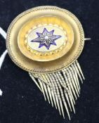 A Victorian gold enamel and seed pearl oval tassel brooch, 1.5in.