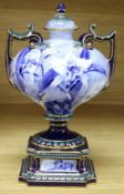 A 19th century overlaid etched blue vase