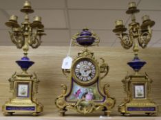 A French 19th century three piece ormolu clock set