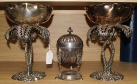 A pair of plated palm tree centre pieces & a Victorian egg warmer