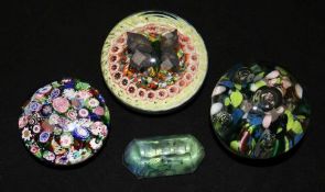 Four paperweights