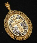 A Victorian gold, enamel and split pearl set filigree pendant with glazed back, (a.f.) 2in excluding