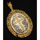 A Victorian gold, enamel and split pearl set filigree pendant with glazed back, (a.f.) 2in excluding