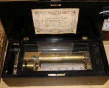 A Swiss six air Etouffoirs en Acier cylinder music box, no. H8020, with part hand-written label,