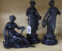A pair of Spelter classical figures and another seated