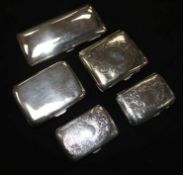 Five assorted silver cigarette cases.