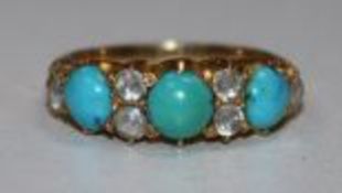 An early 20th century gold, turquoise and white stone set half hoop ring, size M.