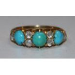 An early 20th century gold, turquoise and white stone set half hoop ring, size M.