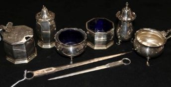 Two Edwardian silver skewers (William Hutton & Sons) and two three-piece silver condiment sets
