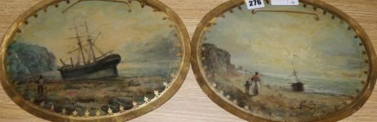 A pair of oval glass paintings of ship wrecks, overall 25 x 33cm, unframed