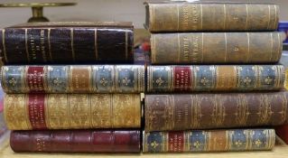 Nine leather bound volumes