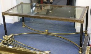 A modern gilt metal framed plate glass topped coffee table, W.110cm