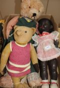 A Pedigree composition black doll, a small early 20C bear, a large bear (faded) and a Royal