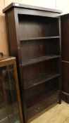 A tall open fronted bookcase, H.180cm