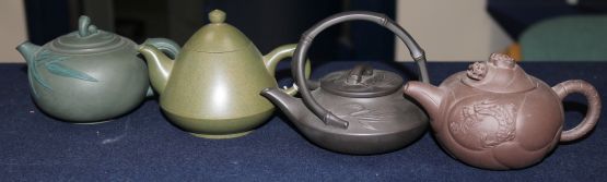 Four Yixing pottery teapots