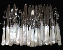 A set of thirteen pairs of George V mother of pearl handled silver dessert eaters by Elkington & Co,