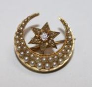 A Victorian gold, diamond and seed pearl set crescent brooch, 0.75in.