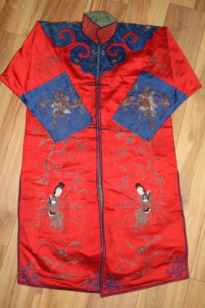 A Chinese red satin embroidered robe