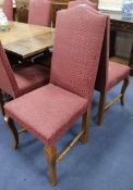 A set of ten upholstered dining chairs