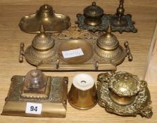 A military inkwell and a collection of brass inkstands