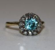 An 18ct blue zircon and diamond cluster ring, size M.