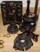 A Japanese lacquer cabinet and various Oriental wood stands