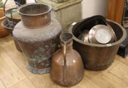A quantity of copper pots and plates