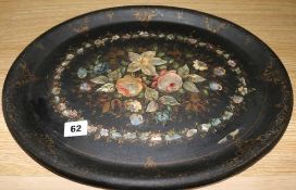 A papier mache tray