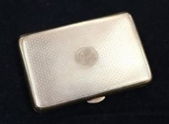 A small 9ct gold engine-turned cigarette case